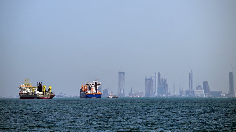Commercial vessels are pictured offshore in Dubai on March 11, 2026. New attacks hit three commercial ships in the Gulf on March 11
