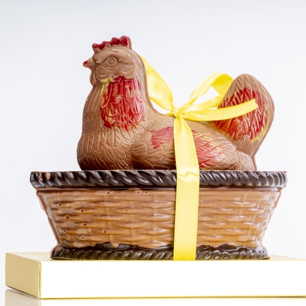 A chocolate hen on a basket