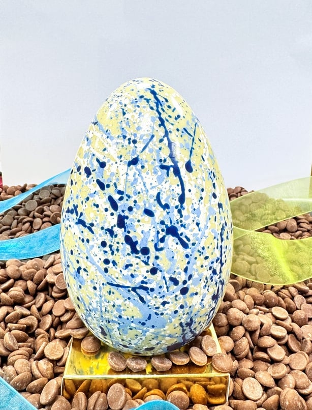A blue painted easter egg