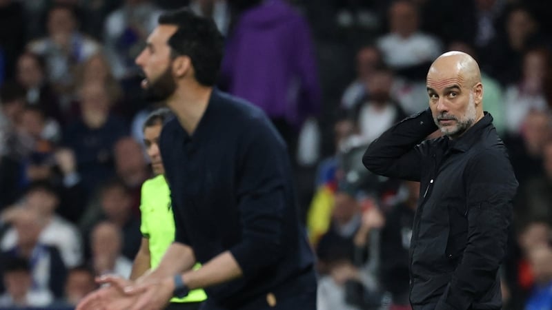 Manchester City's Spanish coach Pep Guardiola looks on during the UEFA Champions League last 16 first leg football match between Real Madrid CF and Manchester City at Santiago Bernabeu Stadium in Madrid on March 11, 2026.