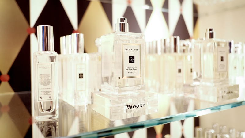 Image of bottles of perfume on a shop shelf