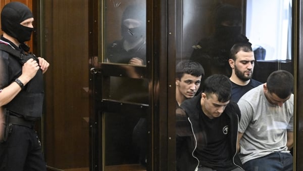 Four men have been jailed for life for an attack on a concert hall in Moscow in 2024