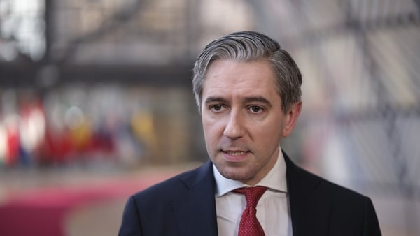 Simon Harris talks to the media