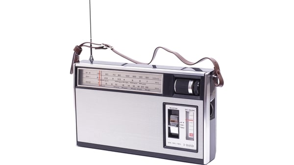 Vintage transistor radio isolated on white background