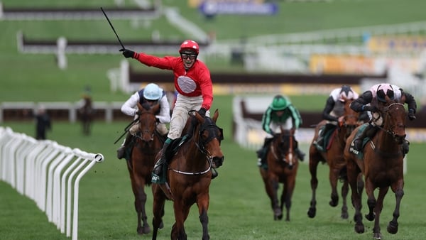 Jockey James Joseph Slevin rides racehorse Home By The Lee to win ahead of third-placed Bob Olinger ridden by jockey Darragh O'Keeffe (R) in the Stayers' Hurdle horse race on the third day of the Cheltenham Festival at Cheltenham Racecourse, in Cheltenham