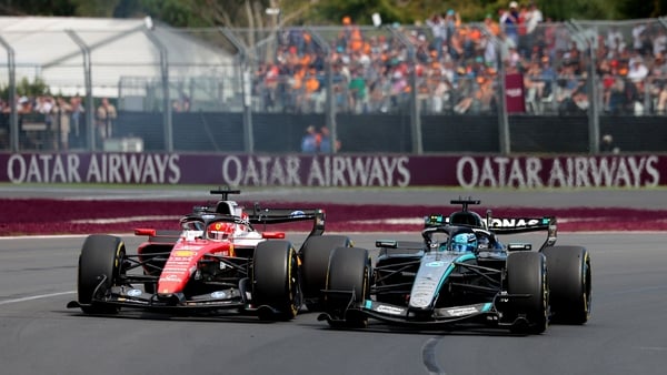 Charles Leclerc of Monaco driving the (16) Scuderia Ferrari SF-26 and George Russell of Great Britain driving the (63) Mercedes AMG Petronas F1 Team W17 battle for the lead during the F1 Grand Prix of Australia at Albert Park Grand Prix Circuit on March 0