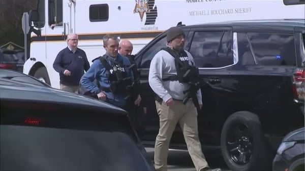 Police arrive on the scene of an active shooter at a synagogue in Michigan