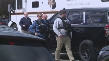 Police arrive on the scene of an active shooter at a synagogue in Michigan