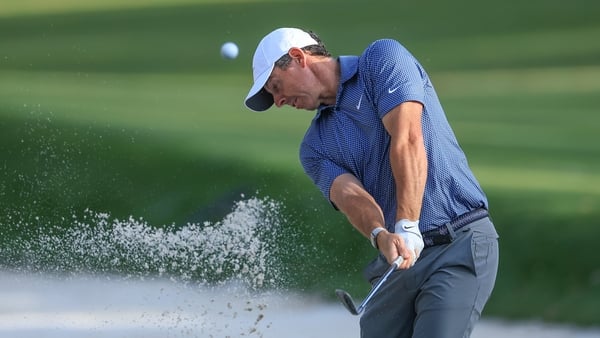 PONTE VEDRA BEACH, FLORIDA - MARCH 12: Rory McIlroy of Northern Ireland plays his second shot on the 15th hole during the first round of THE PLAYERS Championship 2026 at THE PLAYERS Stadium course at TPC Sawgrass on March 12, 2026 in Ponte Vedra Beach, Fl