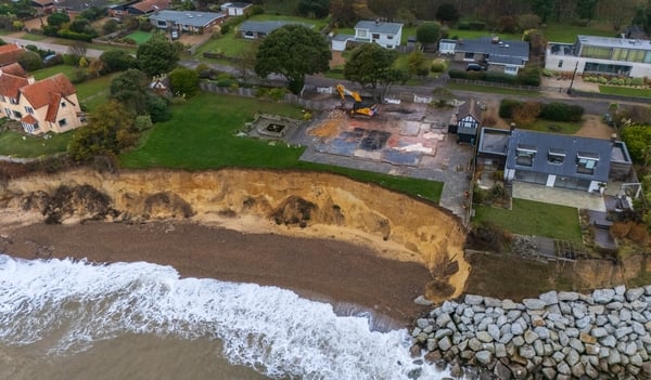 THORPENESS, ENGLAND - NOVEMBER 10: A hard standing remains after a beachside house was demolished because of safety concerns over coastal erosion, on November 10, 2025 in Thorpeness, England. East Anglia, the region including Norfolk and Suffolk, is facin