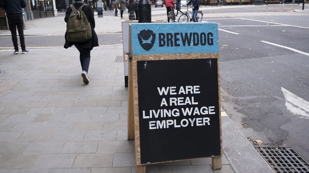 Sign for Brewdog, stating that they are a living wage employer on 1st November 2020 in London, United Kingdom. BrewDog is a Scottish multinational brewery and pub chain. (photo by Mike Kemp/In Pictures via Getty Images) 