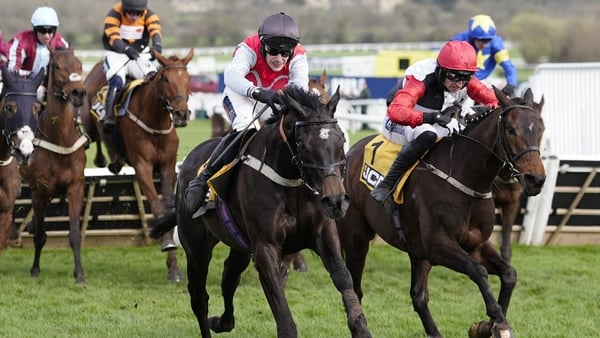Patrick Mullins riding Apolon De Charnie (R, red cap) clear the last to win the 2026 JCB Triumph Hurdle