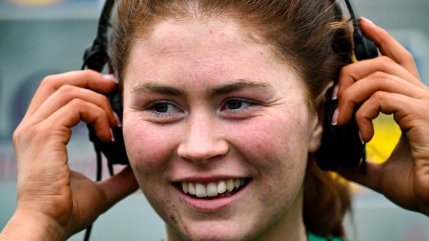 Ciara Smyth of Meath settles a set of headphones as she prepares to be interviewed by TG4 after game against Dublin - February 2026
