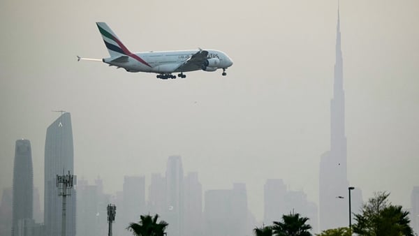 An Emirates Airbus A380 passenger aircraft prepares for landing at Dubai International Airport in Dubai on March 8, 2026. The United States and Israel launched strikes against Iran on February 28, sparking swift retaliation by the Islamic republic which r