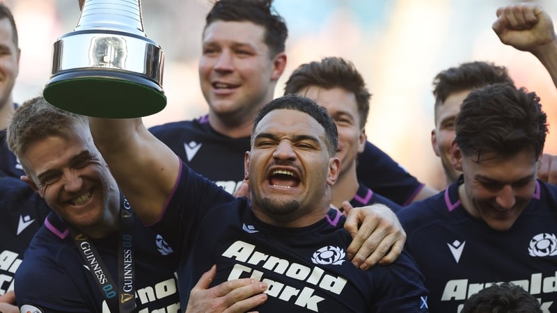 EDINBURGH, SCOTLAND - MARCH 07: Sione Tuipulotu of Scotland celebrates as he is awarded the The Auld Alliance Trophy following his teams victory over France following the Guinness Six Nations 2026 match between Scotland and France at Scottish Gas Murrayfi