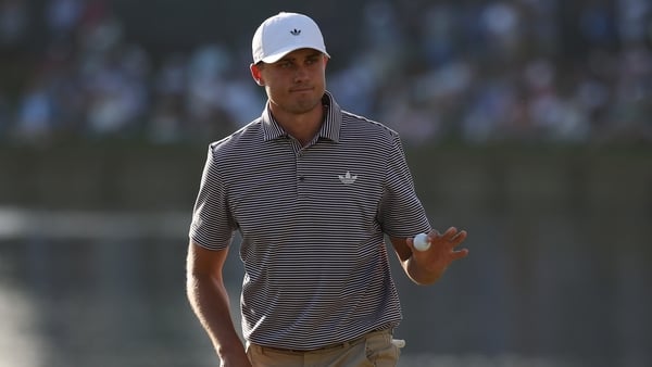 PONTE VEDRA BEACH, FLORIDA - MARCH 13: Ludvig Aberg of Sweden acknowledges the crowd on the 17th green during the second round of THE PLAYERS Championship 2026 at THE PLAYERS Stadium course at TPC Sawgrass on March 13, 2026 in Ponte Vedra Beach, Florida.