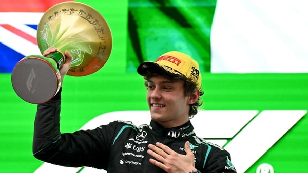 Winner Mercedes' Italian driver Kimi Antonelli celebrates on the podium after the Formula One Chinese Grand Prix at the Shanghai International Circuit in Shanghai on March 15, 2026.