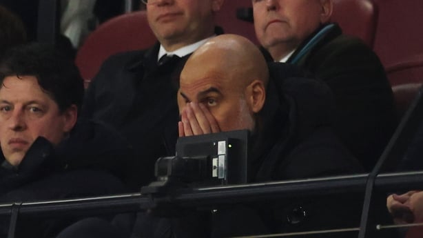 LONDON, ENGLAND - MARCH 14: Pep Guardiola, Manager of Manchester City, watches on from the stands during the Premier League match between West Ham United and Manchester City at London Stadium on March 14, 2026 in London, England. (Photo by Richard Pelham/Getty Images)