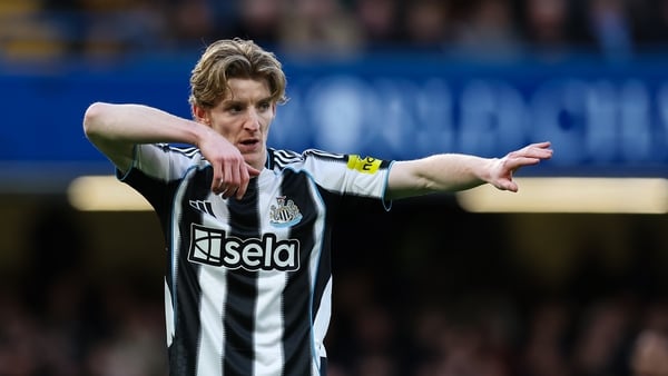 Newcastle United's Anthony Gordon gestures during the Premier League match between Chelsea and Newcastle United at Stamford Bridge on March 14, 2026 in London, England.