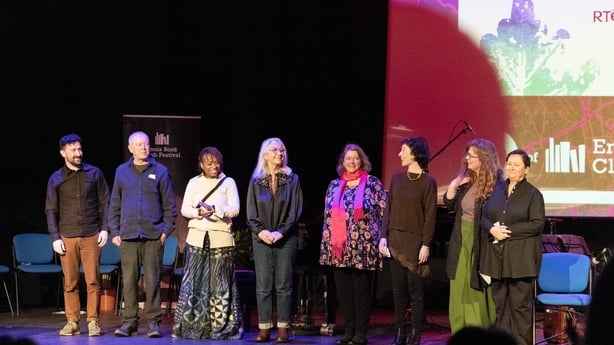 Sunday Miscellany writers on stage at Ennis Book Club Festival in Glór, March 2026 (l to r: Mattie Brennan, Hugo Hamilton, Abi Daré, Éilis Ní Dhuibhne, Karen J McDonnell, Niamh Campbell Laoighseach Ní Choistealbha and Anne Enright / pic credit: Eamon Ward)