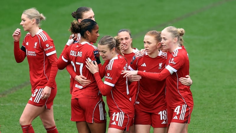 Ceri Holland of Liverpool (2R) celebrates scoring her team's second goal with teammates during the Barclays Women's Super League match between Liverpool and Leicester City at The St Helens Stadium on March 15, 2026 in St Helens, England.