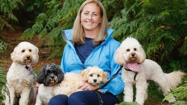 Animal behaviourist Suzi Walsh with a group of small dogs