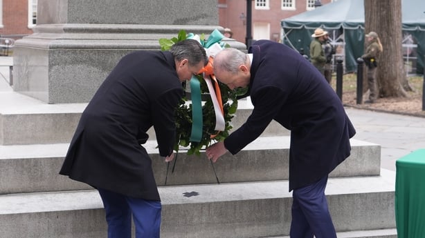 Taoiseach Micheal Martin and Brendan Francis Boyle lay a wreath at the Commodore John Barry statue at Independence Square in Philadelphia
