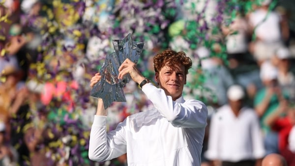 Jannik Sinner of Italy hoists the championship trophy after defeating Daniil Medvedev during their Men's Singles Finals match on Day 12 of the BNP Paribas Open at Indian Wells Tennis Garden on March 15, 2026 in Indian Wells, California