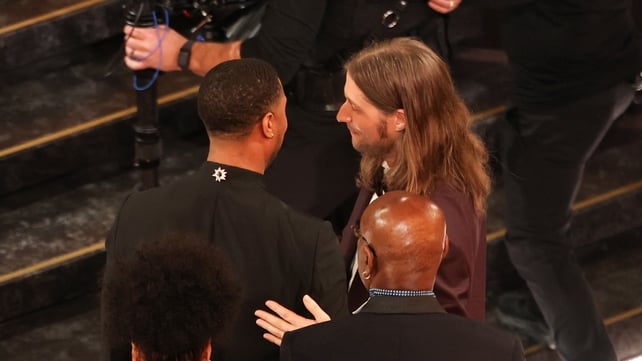 Ludwig Goransson (R) embraces US actor Michael B. Jordan