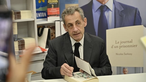 Former France's President Nicolas Sarkozy attends his signing event for the release of his book.