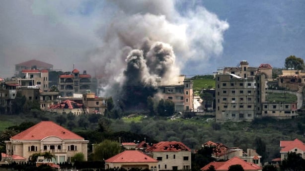 Smoke plumes rise following Israeli bombardment on the village of Khiam in southern Lebanon near the border with Israel, as seen from nearby Marjayoun, on March 16, 2026