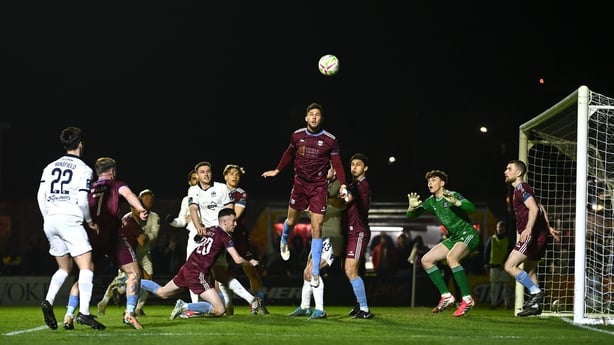 Mattie Wolfe of Galway United heads clear against Waterford FC, March 2026
