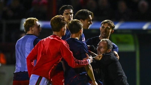16 March 2026; Bohemians first team coach Derek Pender, right, tussles with Shelbourne players before the SSE Airtricity Men's Premier Division match between Shelbourne and Bohemians at Tolka Park in Dublin. Photo by Tyler Miller/Sportsfile