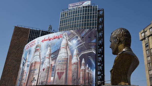 A huge art work banner on the corner of Vali Asr Square in Tehran depicts Iranian missiles