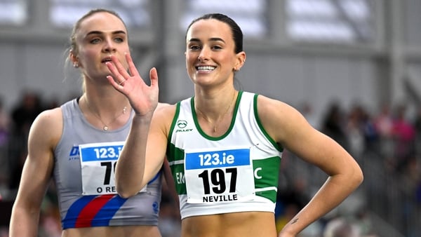 1 March 2026; Ciara Neville of Emerald AC, Limerick, right, after winning the women's 60m during day two of the 123.ie National Senior Indoor Championships at the National Indoor Arena on the Sport Ireland Campus in Dublin. Photo by Sam Barnes/Sportsfile
