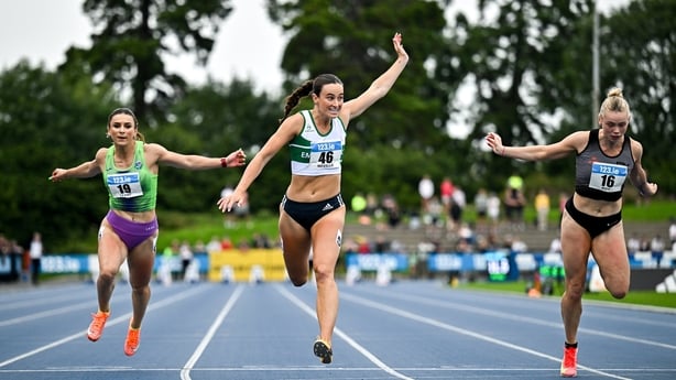 3 August 2025; Ciara Neville of Emerald AC, Limerick, centre, crosses the line to win the senior women's 100m final, ahead of Sarah Leahy of Killarney Valley AC, Kerry, left, and Lauren Roy of Fast Twitch AC, right, during day two of the 153rd 123.ie National Track & Field Senior Championships at Mo