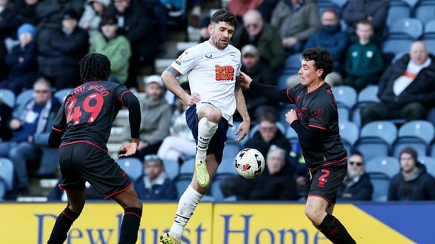 Preston North End's Robbie Brady controls the ball under pressure from Millwall's Dan McNamara and Derek Mazou-Sacko during the Sky Bet Championship match between Preston North End and Millwall at Deepdale Stadium on February 28, 2026 in Preston, United Kingdom.