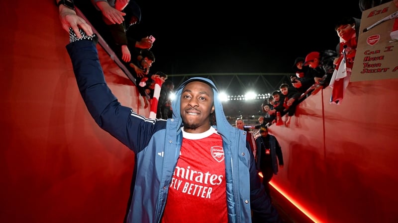 Eberechi Eze of Arsenal high fives fans following the teams victory in the UEFA Champions League 2025/26 Round of 16 Second Leg match between Arsenal FC and Bayer 04 Leverkusen at Arsenal Stadium on March 17, 2026 in London, England.