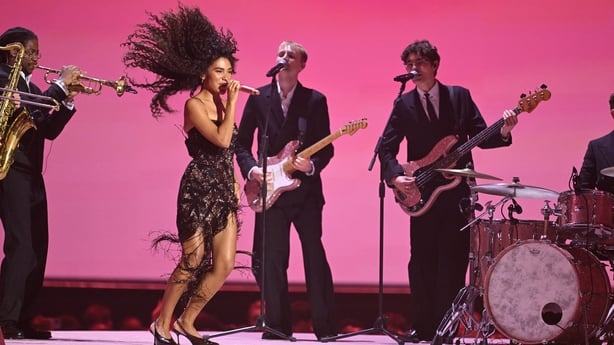 Olivia Dean performs Man I Need on stage during The BRIT Awards 2026 at Co-op Live on 28 February, 2026 in Manchester, England. (Photo by Samir Hussein/WireImage)