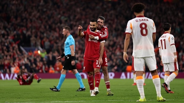 Mo Salah celebrates his goal against Galatasaray with team-mate Dominik Szoboszlai
