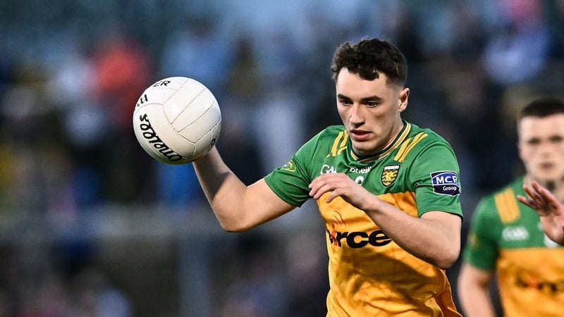 30 April 2025; Kevin Muldoon of Donegal in action against Matthew Quinn of Tyrone during the Dalata Hotel Group Ulster GAA Football U20 Championship final match between Donegal and Tyrone at Owenbeg Derry GAA Centre in Dungiven, Derry. Photo by Piaras Ó M