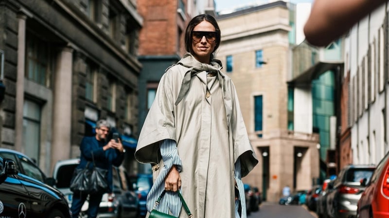 A woman wearing a rain jacket