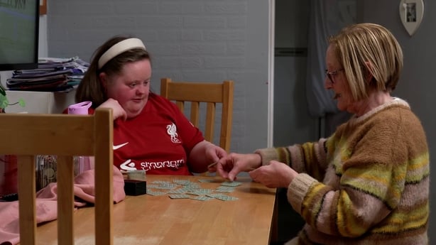 Gladys Hand (right) cares for her daughter Jessica