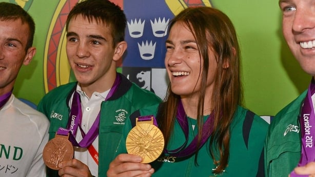 Michael Conlan and Olympic champion Katie Taylor on their arrival home from the London 2012 Olympic Games. Dublin Airport, Dublin.