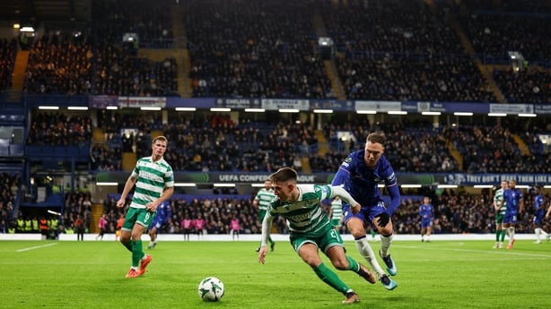 Darragh Burns of Shamrock Rovers in action against Harvey Vale of Chelsea during the UEFA Conference League 2024/25 league phase match between Chelsea and Shamrock Rovers at Stamford Bridge in London, England.