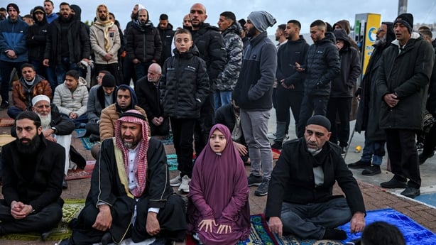 Muslim worshippers gather outside the Jerusalem old city walls on 20 March