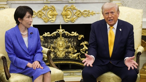 Prime Minister of Japan Sanae Takaichi listens as US President Donald Trump speaks during a bilateral meeting in the Oval Office
