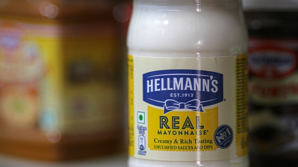 A jar of Hellmann's mayonnaise on a shop shelf