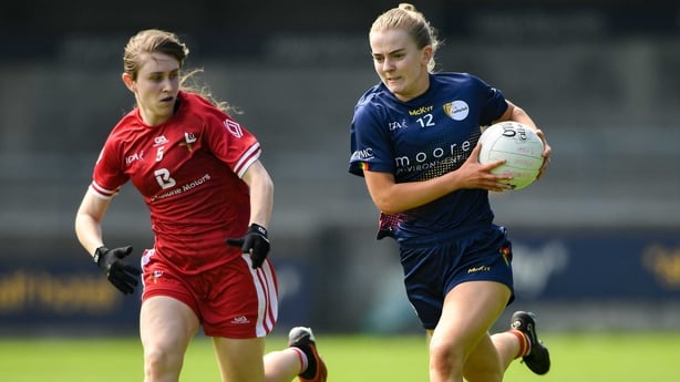Sara Doyle of Carlow in action against Louise Byrne