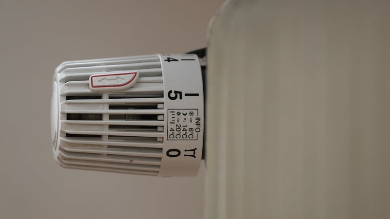 KOTTGEISERING, GERMANY - JANUARY 10: A heating valve is seen attached to a radiator in a residential house on January 10, 2026 in Kottgeisering, Germany. Costs for oil and gas-fired heating systems will rise in 2026 in Germany due to a higher CO2 charge.